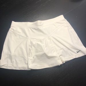 White pleated Nike tennis skirt